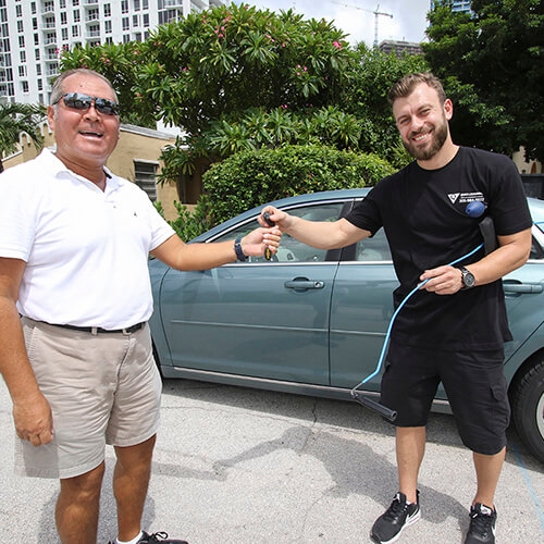 Happy Client After Providing Him Emergency Car Locksmith Services In Miami FL