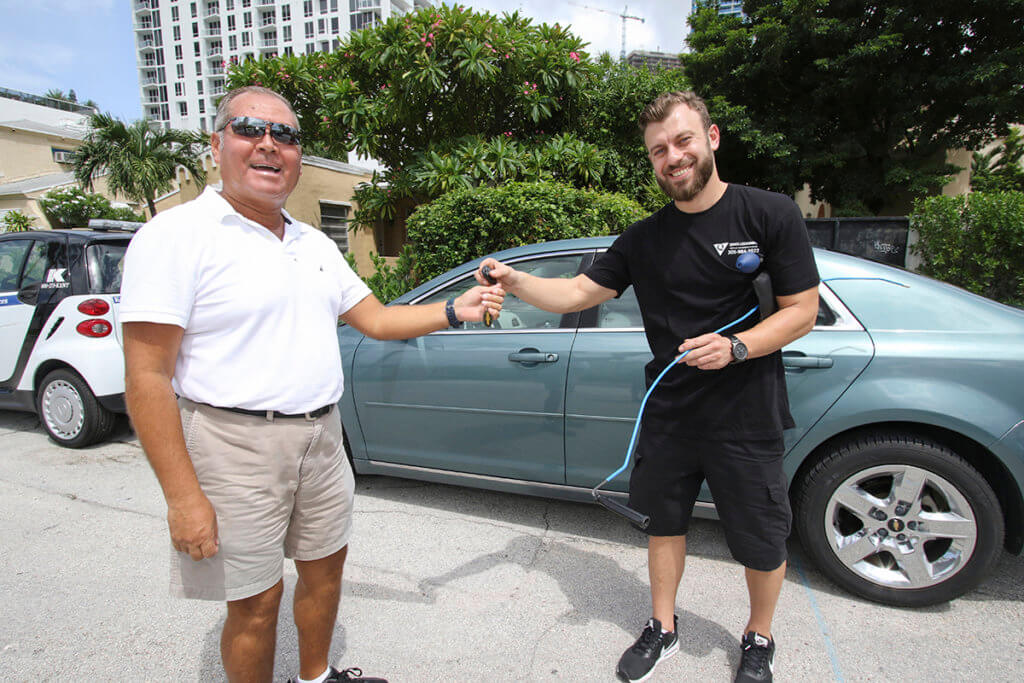 Satisfied Costumer After Getting His Car Keys Replaced By Our Automobile locksmith services technician In Miami FL - Quickly Locksmith Miami