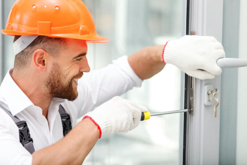 locksmith technician finishes fresh lock & cylinder installation in Miami FL