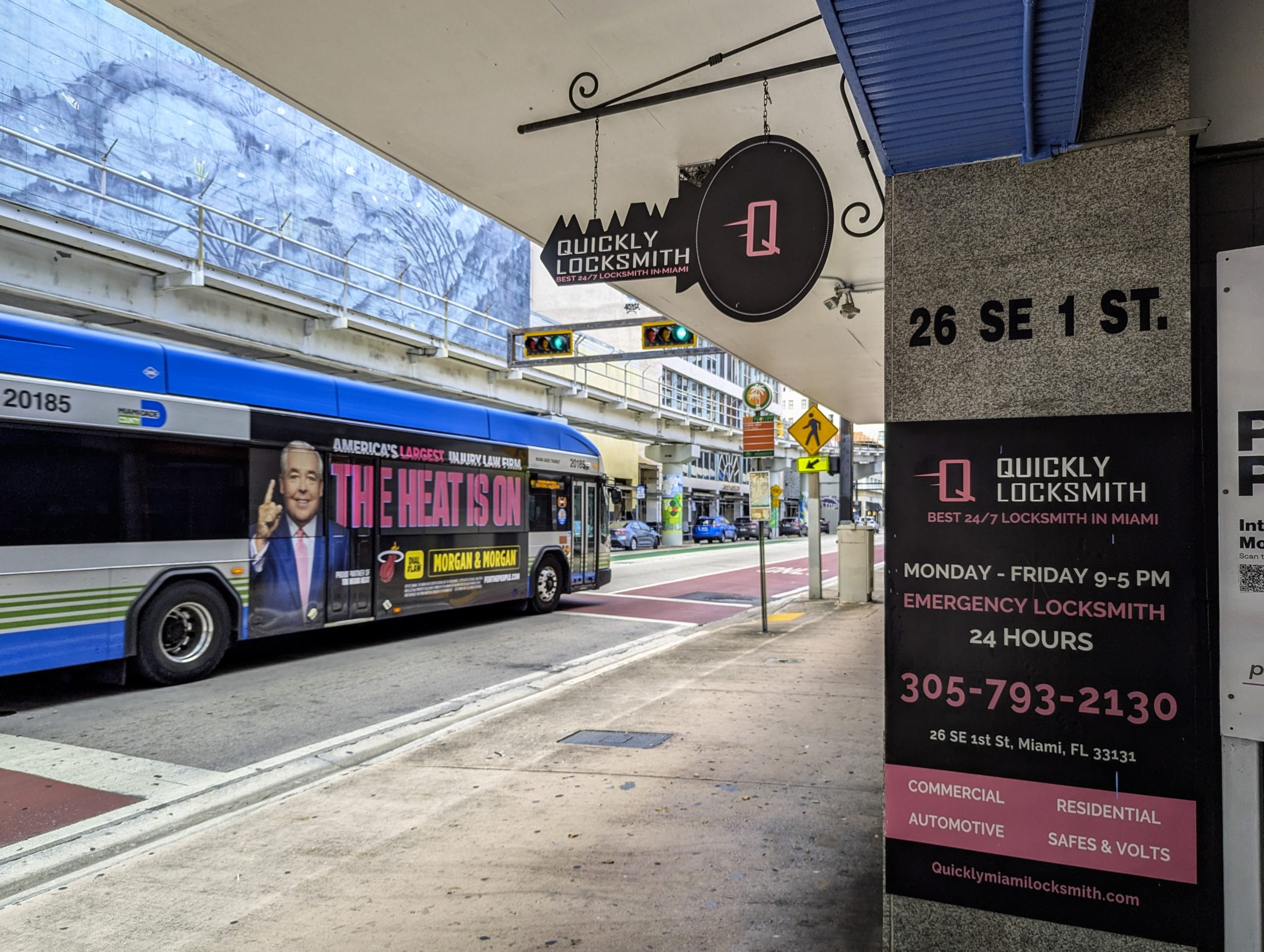 Quickly Locksmith Miami Downtown storefront beside the bus stop.