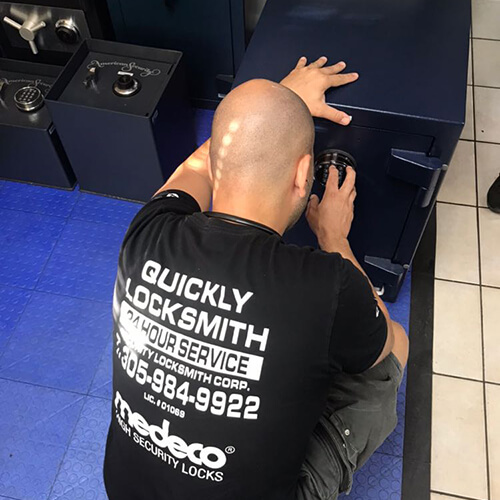 Our locksmith technician unlocks a stuck & locked old safe at a commercial clients business in Miami FL